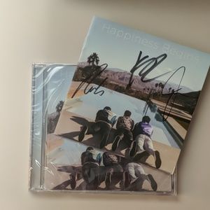 Happiness Begins - signed Jonas Brothers CD